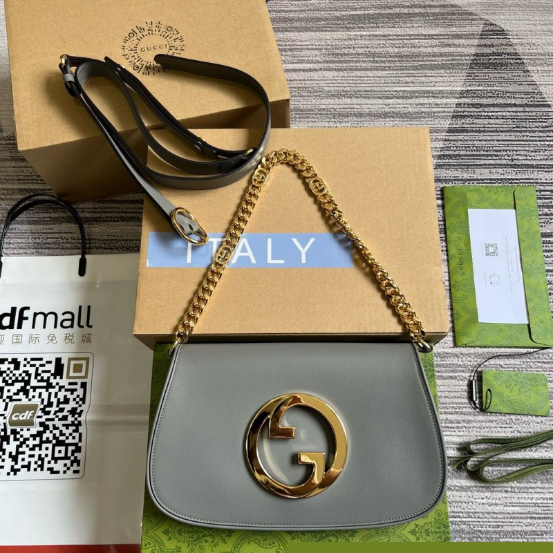 G*u*i top handle bags